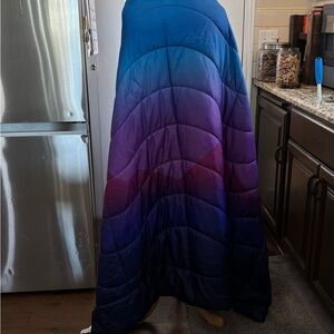 Weatherproof Blue and Purple hooded blanket packable with bag.